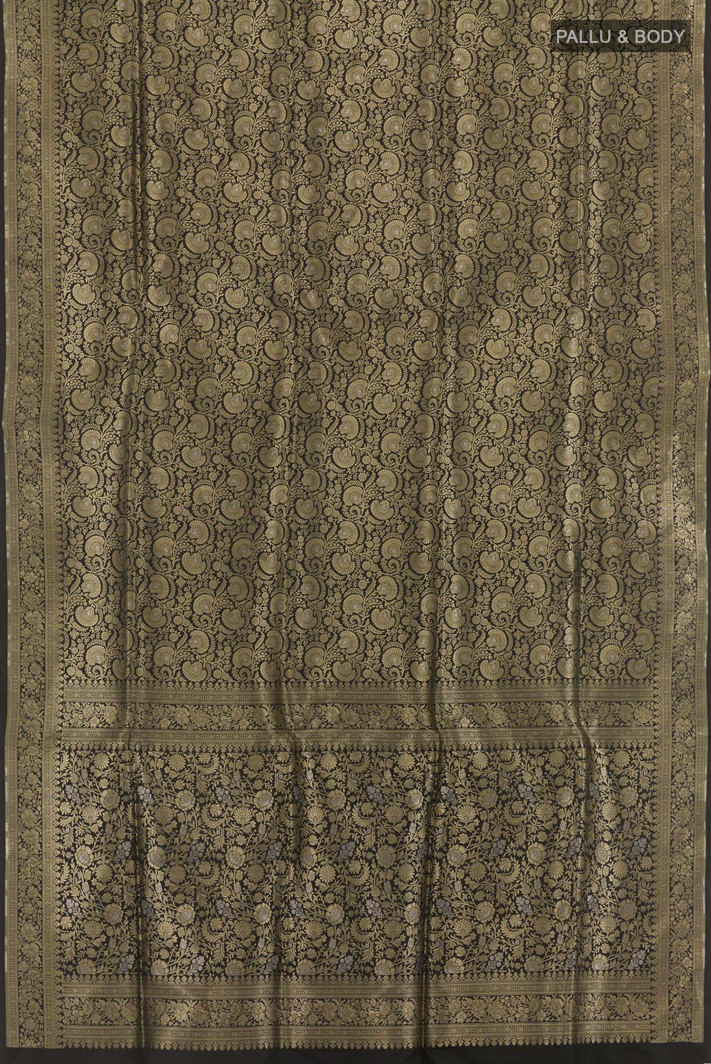 Flat view of Black Banarasi Silk Saree with Zari Brocade on the body and Zari Border. 