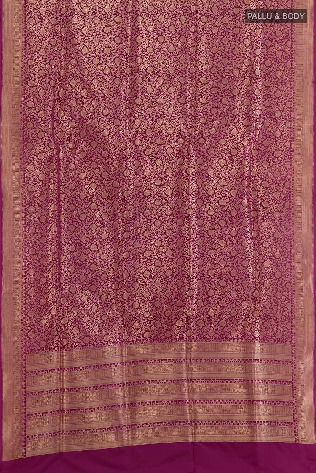 Flat view of Magenta Banarasi Silk Saree with Zari Brocade on the body and Zari Border. 