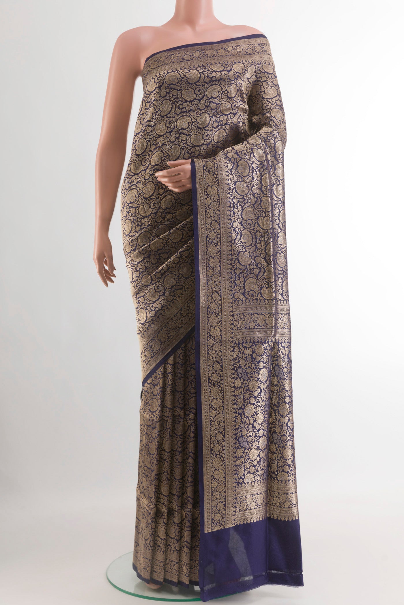Navy Blue Banarasi Silk Saree with Zari Brocade on the body and Zari Border.  displayed on a mannequin
