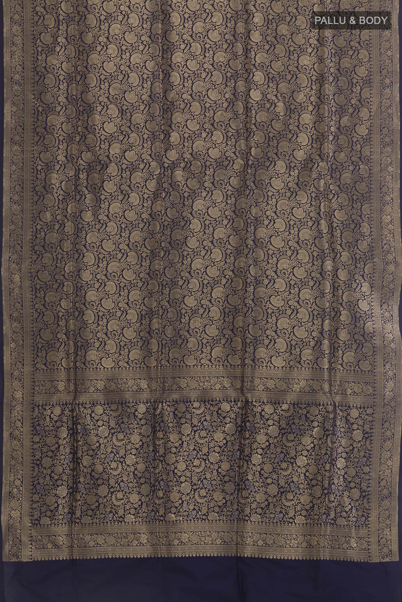 Flat view of Navy Blue Banarasi Silk Saree with Zari Brocade on the body and Zari Border. 