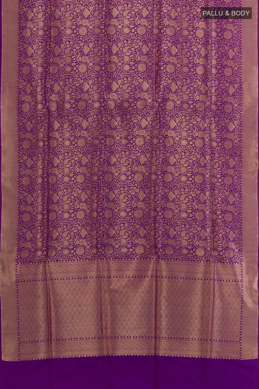Flat view of Purple Banarasi Silk Saree with Zari Brocade on the body and Zari Border. 