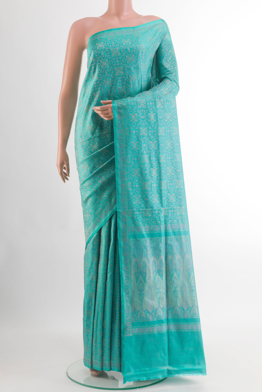 Blue Banarasi Tanchoi Silk Saree with Jacquard design on the body and Zari Border.  displayed on a mannequin