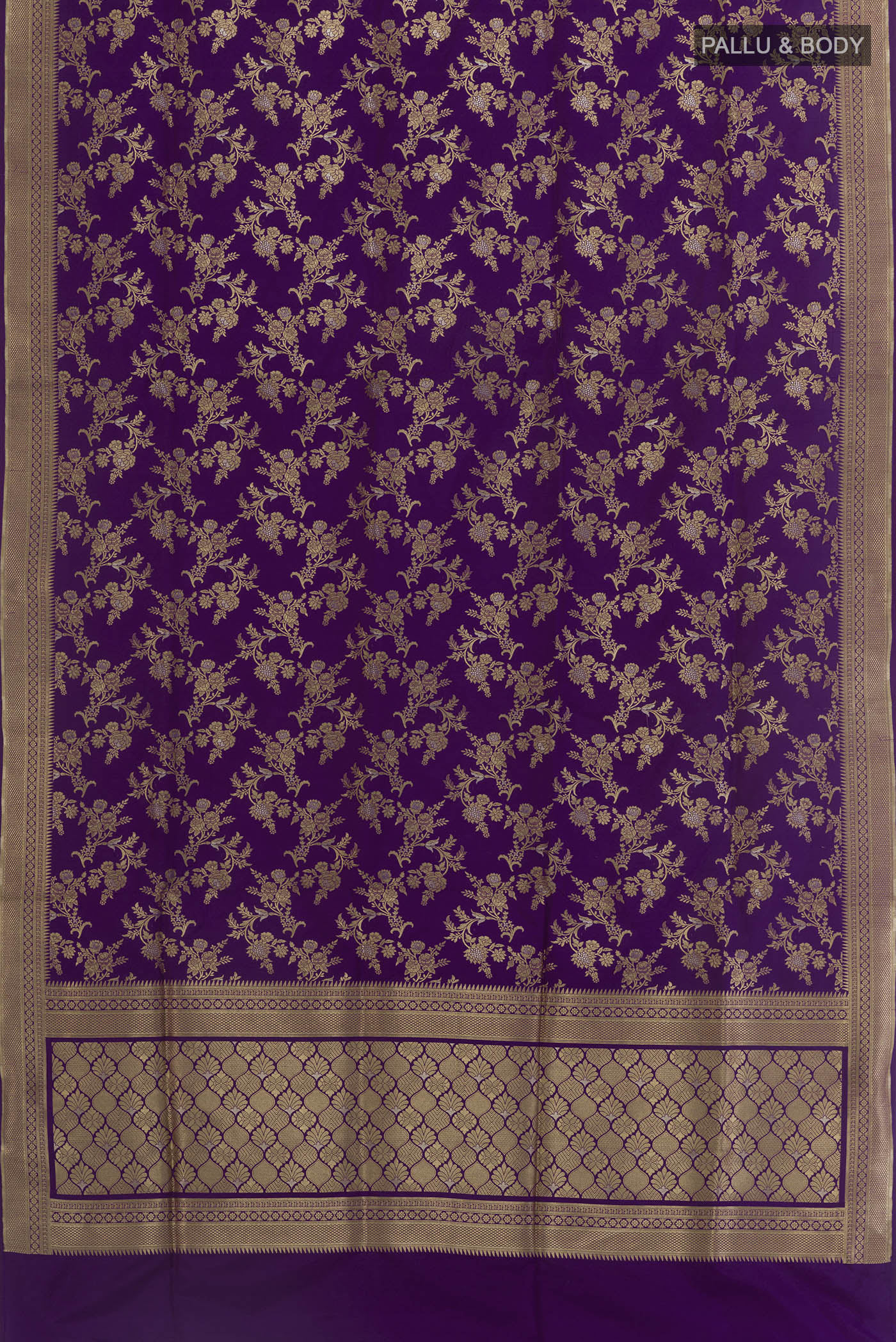 Flat view of Violet Banarasi Silk Saree with Zari Brocade on the body and Zari Border. 