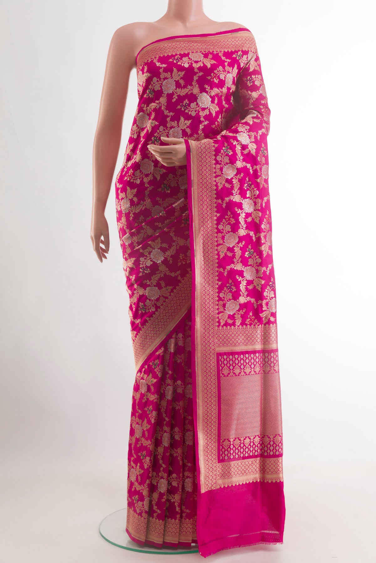 Pure Silk Pink Banarasi Saree with Zari Brocade on the body and Zari Border.  displayed on a mannequin