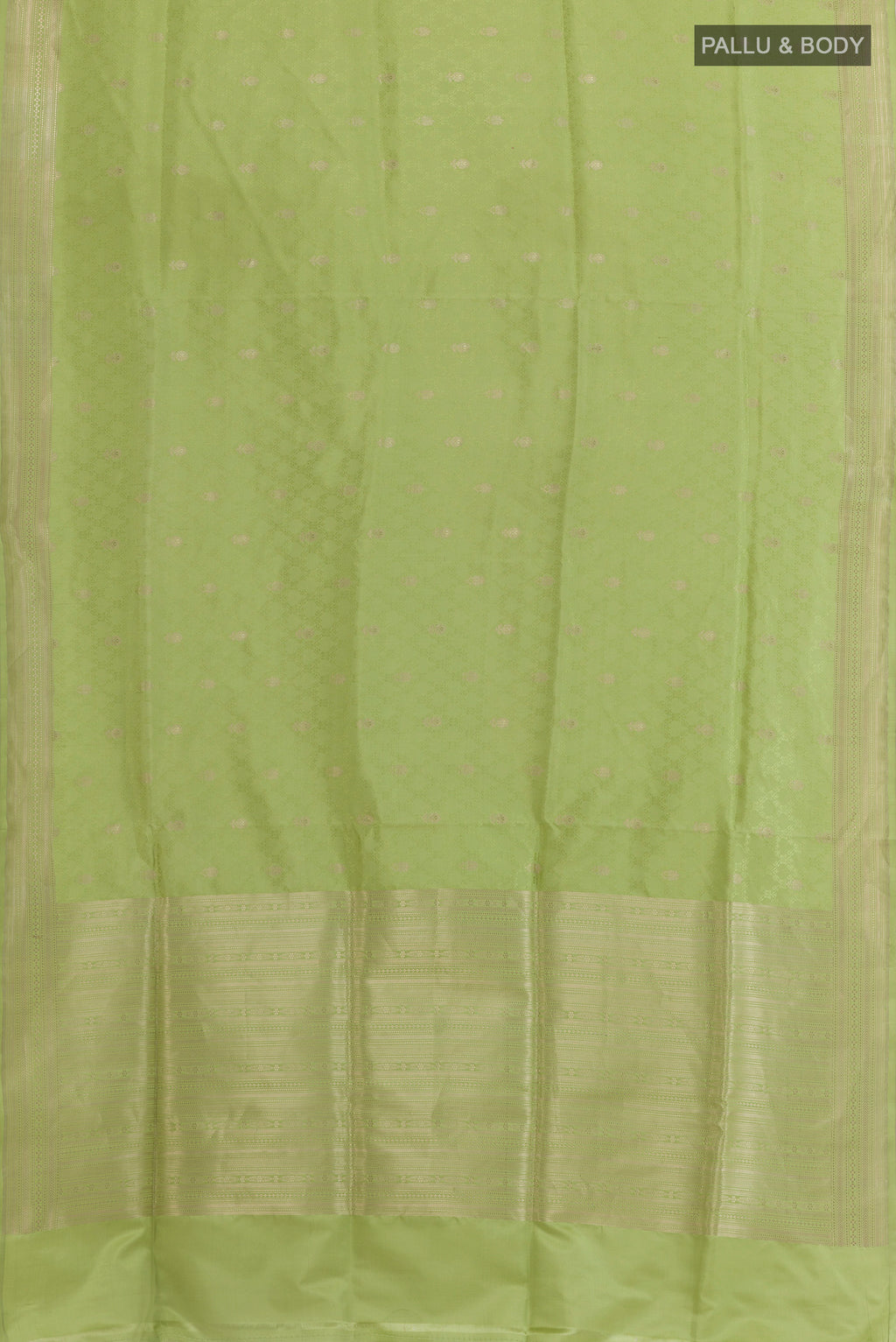 Flat view of Pista Green Banarasi Silk Saree with Jacquard With Zari Butta on the body and Zari Border. 
