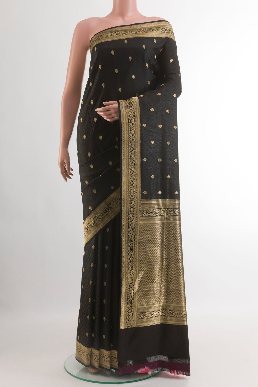 Black Banarasi Silk Saree with Jacquard With Zari Butta on the body and Zari Border.  displayed on a mannequin