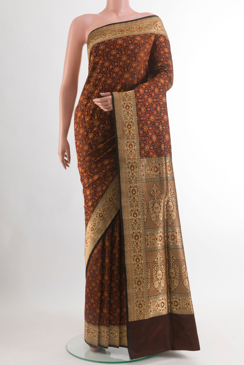 Brown Banarasi Tanchoi Silk Saree with Jacquard design on the body and Zari Border.  displayed on a mannequin