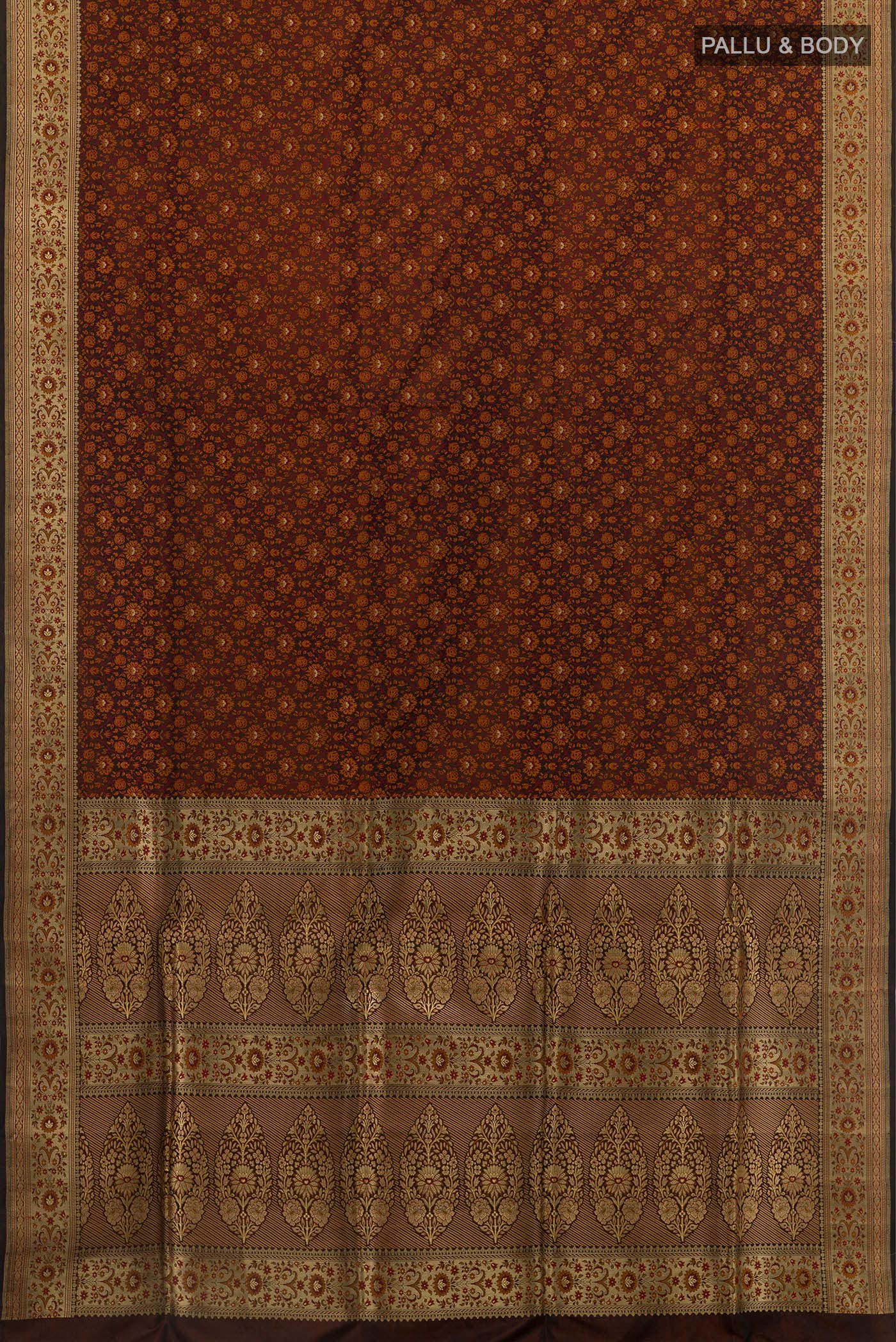 Flat view of Brown Banarasi Tanchoi Silk Saree with Jacquard design on the body and Zari Border. 