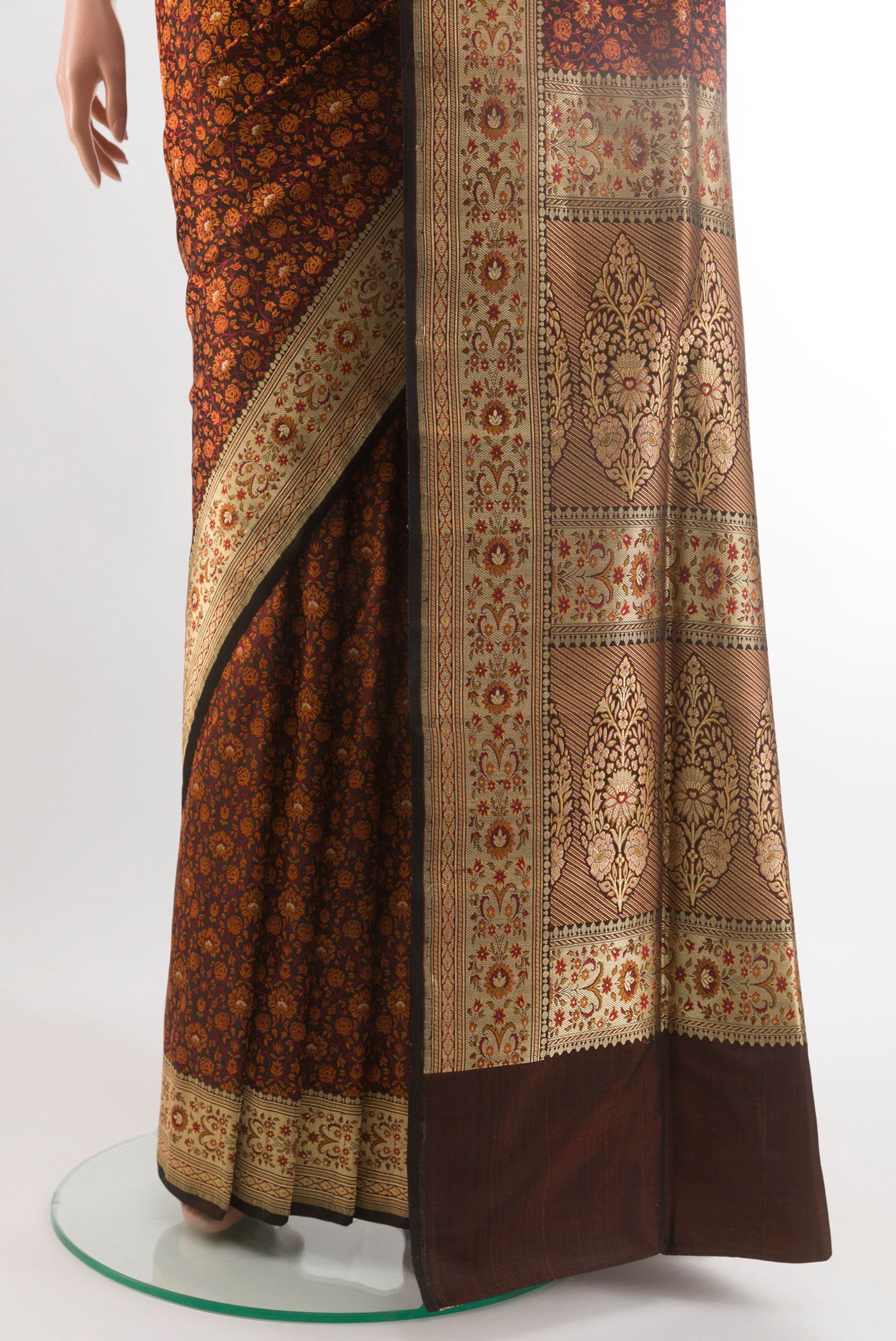 Pleats and pallu of Brown Banarasi Tanchoi Silk Saree with Jacquard design on the body and Zari Border. 