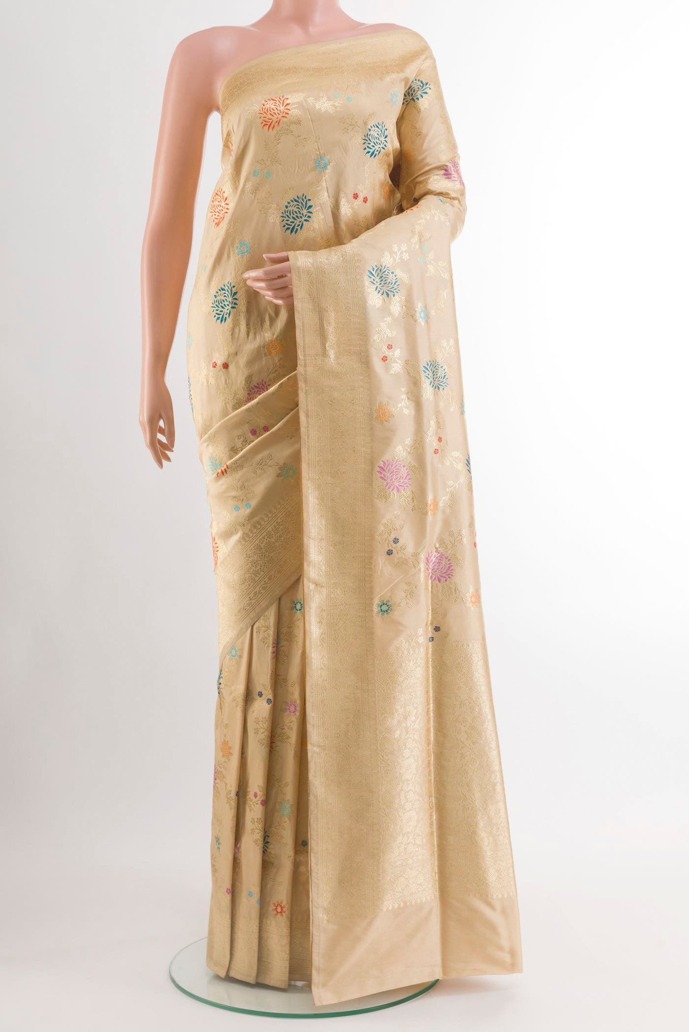 Beige Banarasi Silk Saree with Zari And Thread Butta on the body and Zari Border.  displayed on a mannequin
