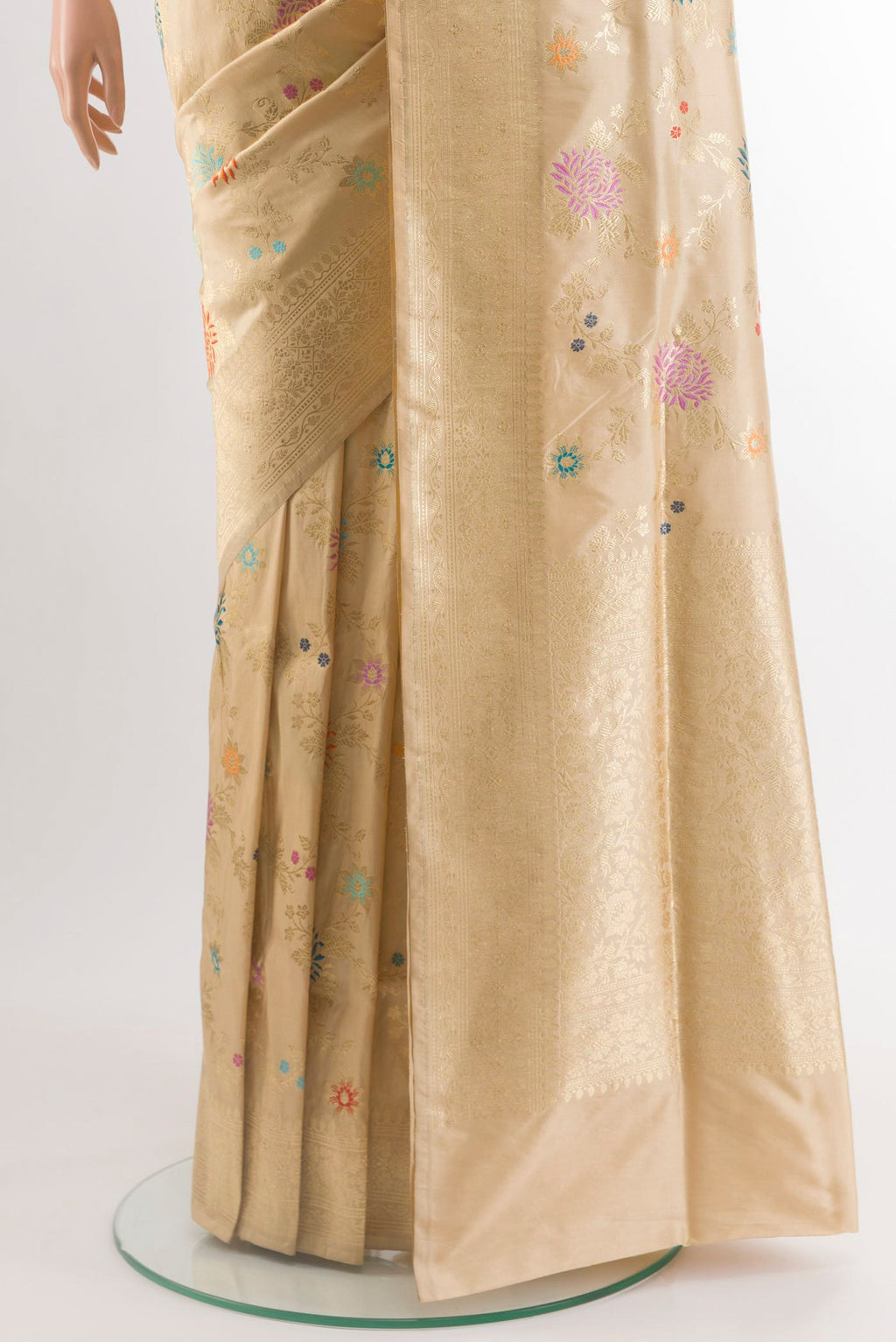 Pleats and pallu of Beige Banarasi Silk Saree with Zari And Thread Butta on the body and Zari Border. 