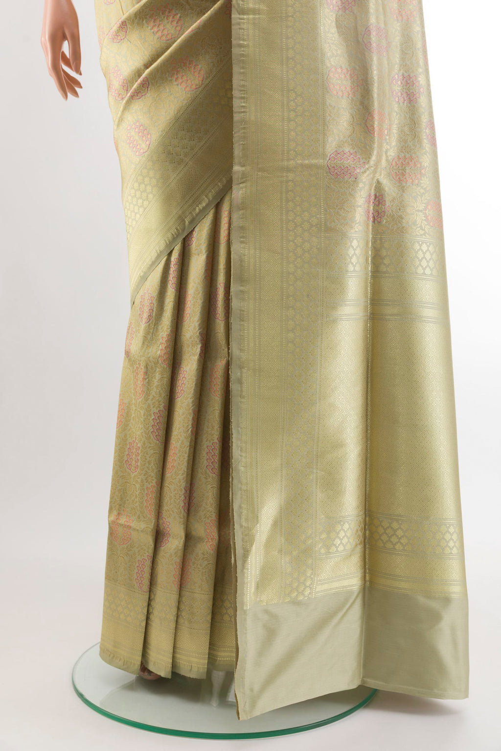 Pleats and pallu of Beige Banarasi Silk Saree with Zari Brocade on the body and Zari Border. 