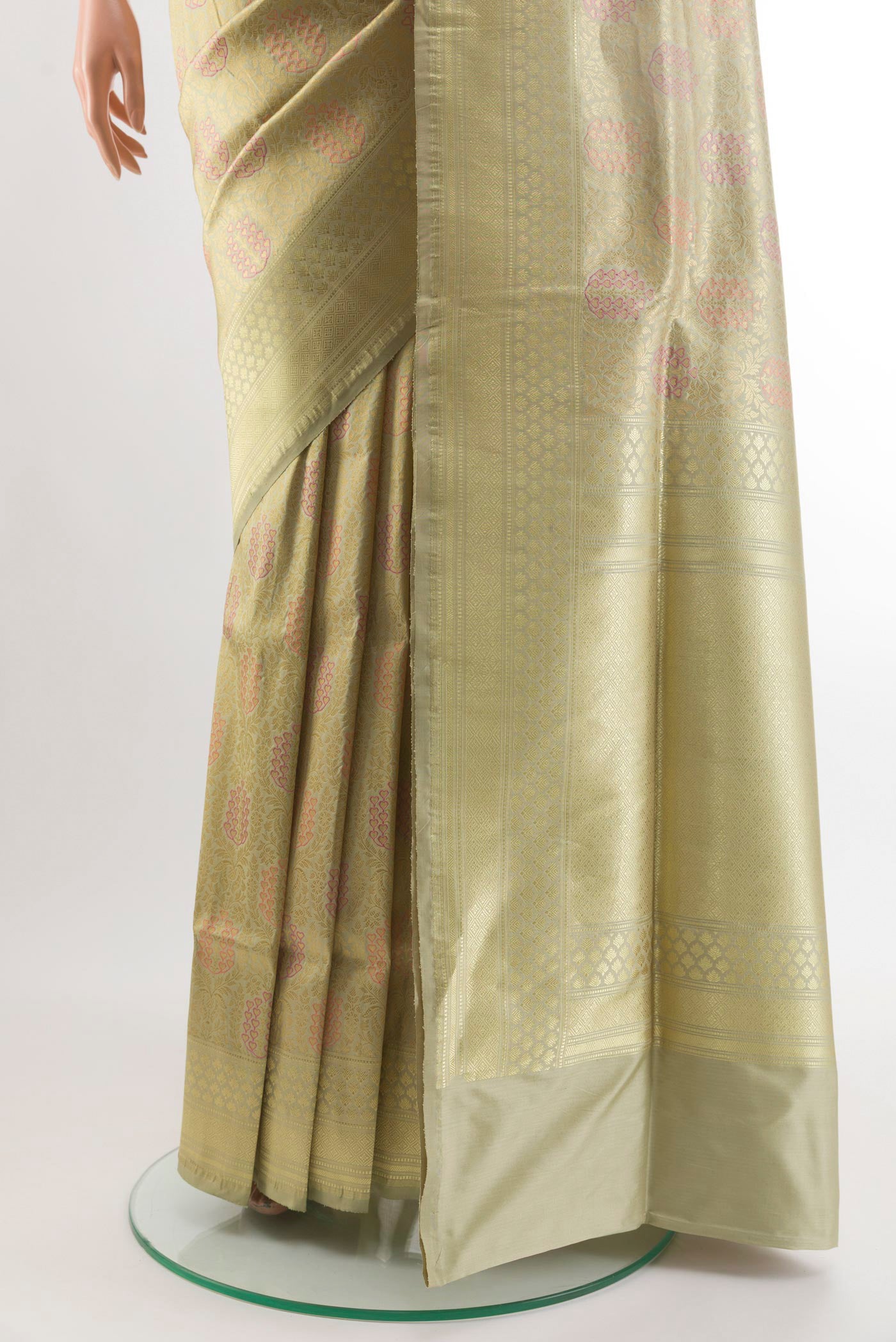 Pleats and pallu of Beige Banarasi Silk Saree with Zari Brocade on the body and Zari Border. 