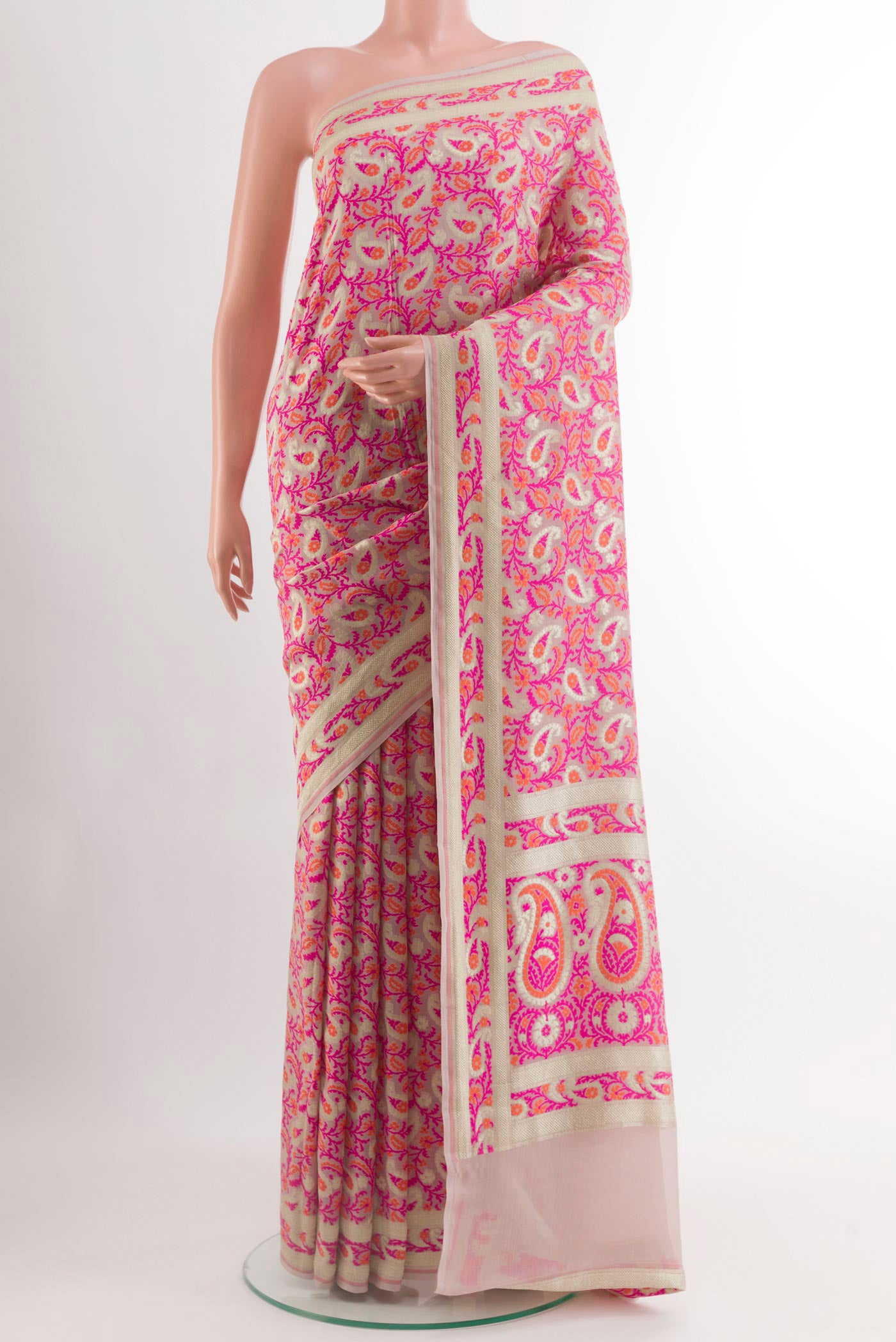 Multi Color Banarasi Georgette Saree with Thread Brocade on the body and Thread Embroidery Border.  displayed on a mannequin