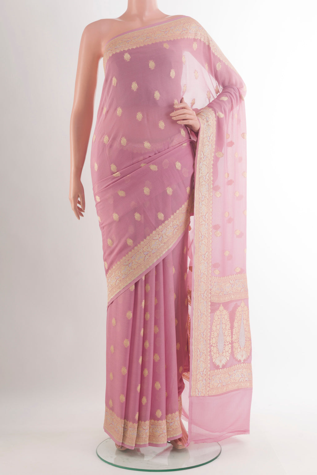 Pink Banarasi Georgette Saree with Zari Butta on the body and Zari Border.  displayed on a mannequin
