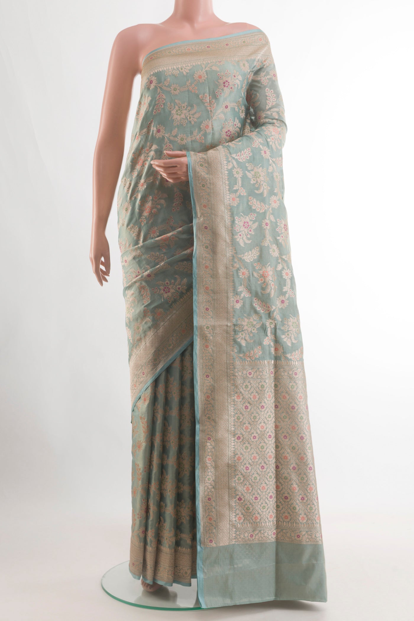 Light Blue Banarasi Silk Saree with Zari Brocade on the body and Zari Border.  displayed on a mannequin