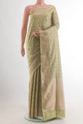 Pure Silk Beige Banarasi Saree with Zari Brocade on the body and Zari Border.  displayed on a mannequin
