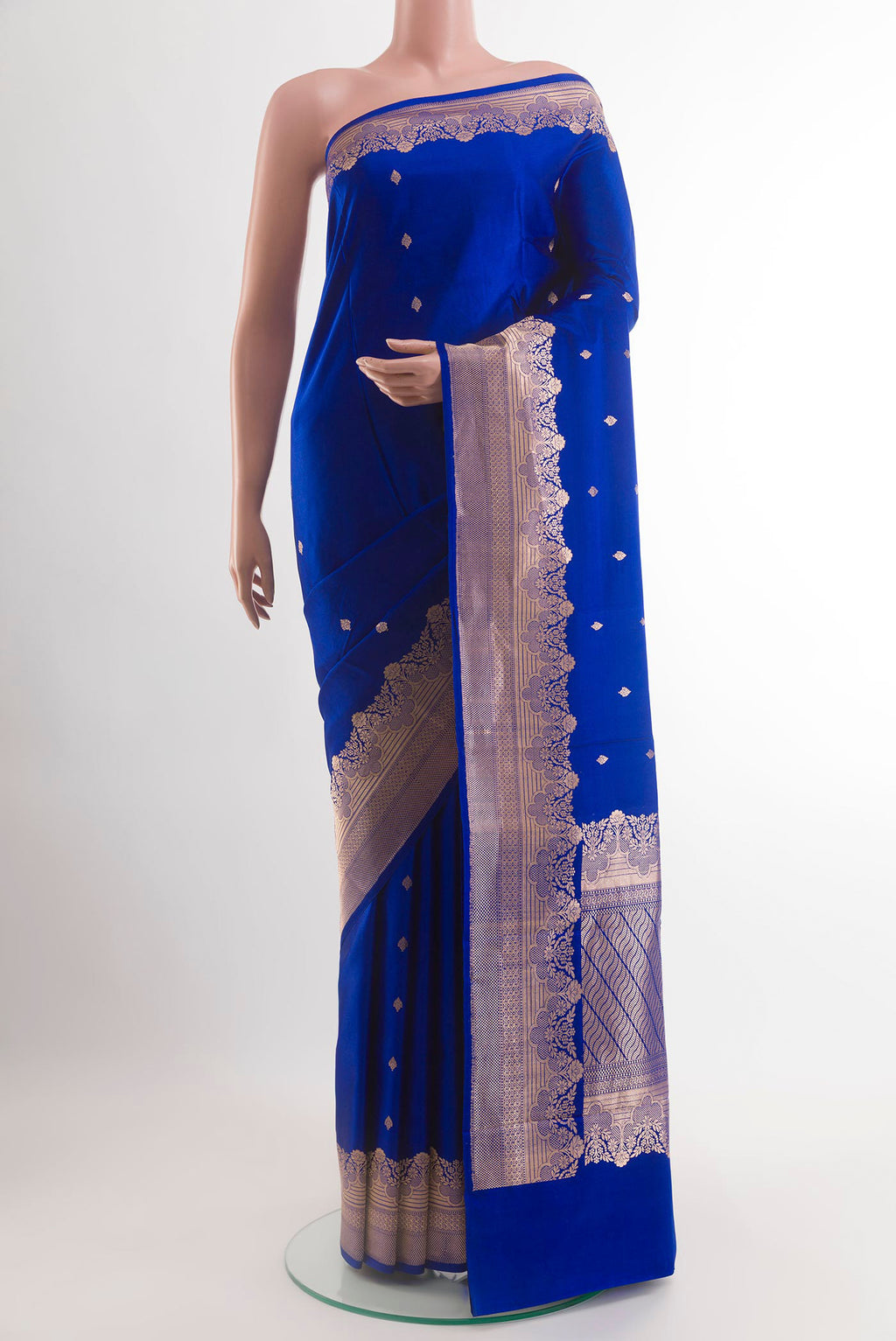 Royal Blue Banarasi Silk Saree with Zari Butta on the body and Zari Border.  displayed on a mannequin