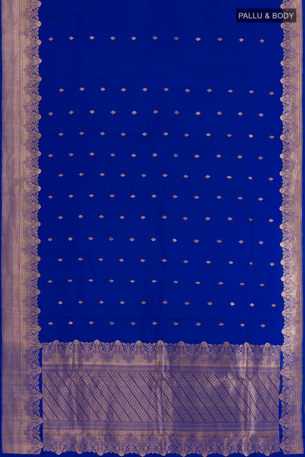 Flat view of Royal Blue Banarasi Silk Saree with Zari Butta on the body and Zari Border. 