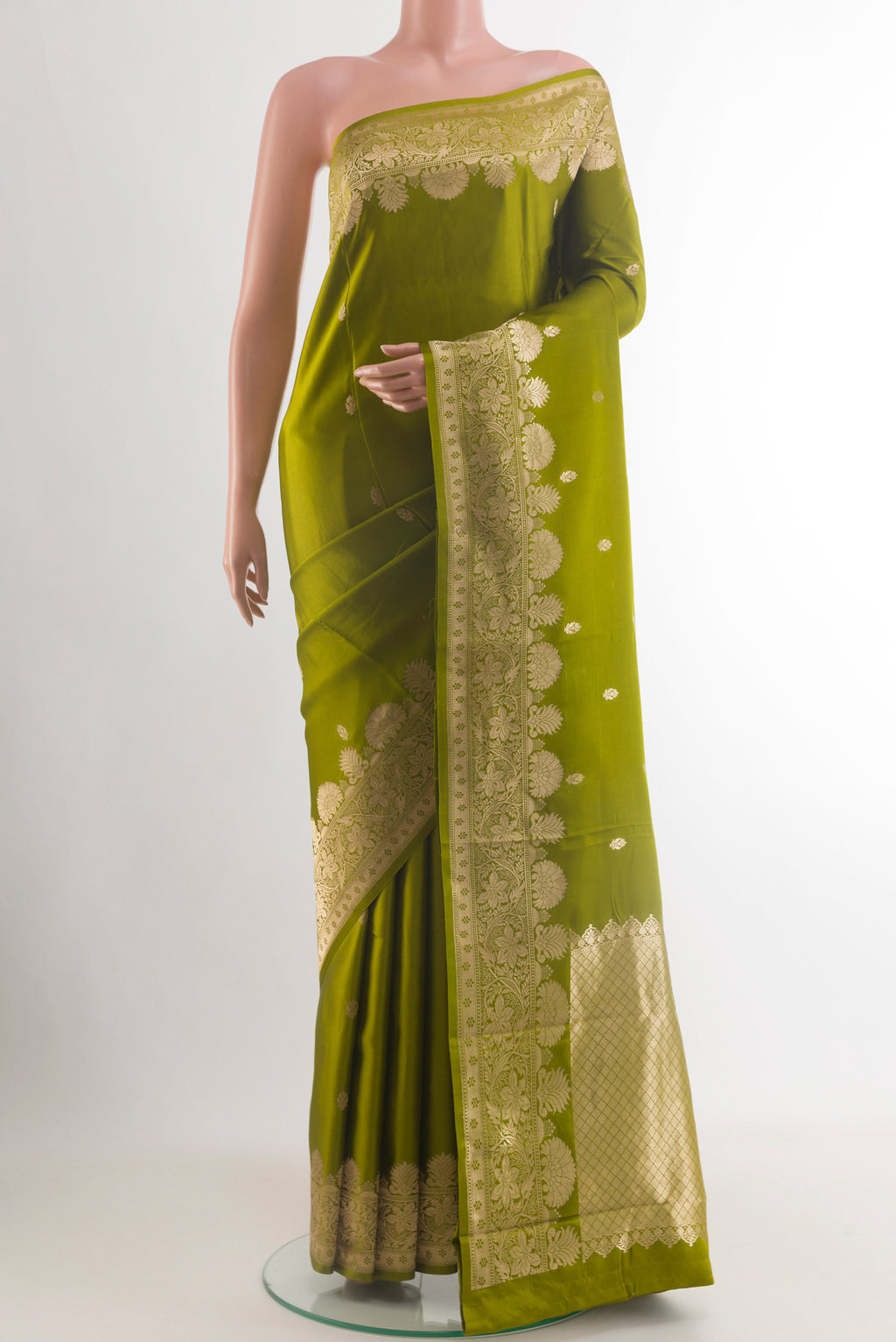 Mehandi Green Banarasi Katan Silk Saree with Zari Butta on the body and Zari Border.  displayed on a mannequin