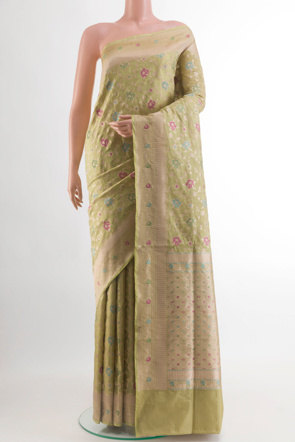 Light Green Banarasi Silk Saree with Zari Brocade on the body and Zari Border.  displayed on a mannequin