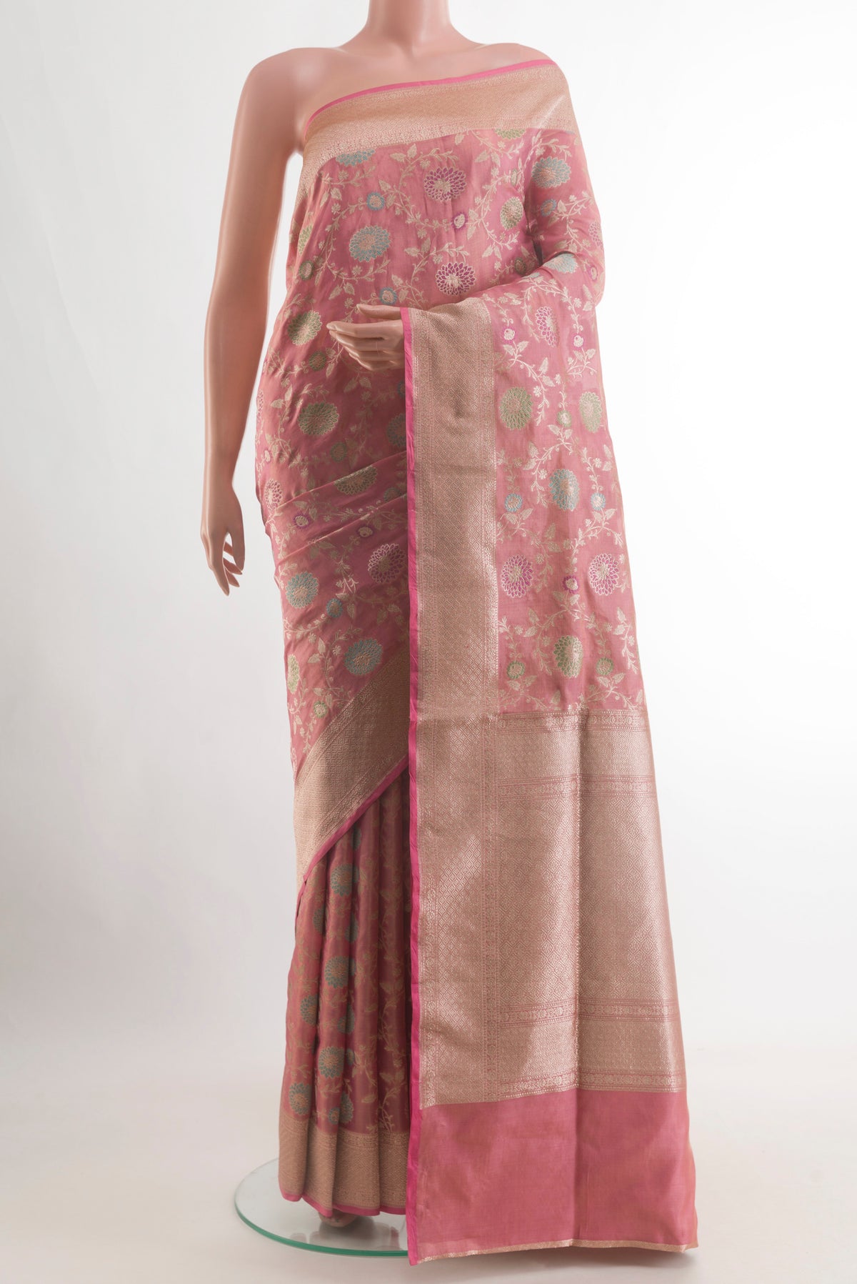 Pink Banarasi Tissue Silk Saree with Zari Brocade on the body and Zari Border.  displayed on a mannequin