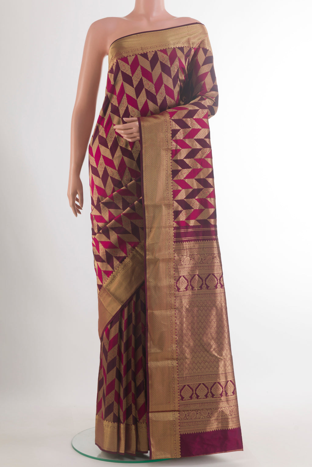 Pure Silk Purple Kanchipuram Saree with Zari Brocade on the body and Zari Border.  displayed on a mannequin
