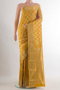 Pure Silk Mustard Kanchipuram Saree with Zari Brocade on the body and Zari Border.  displayed on a mannequin