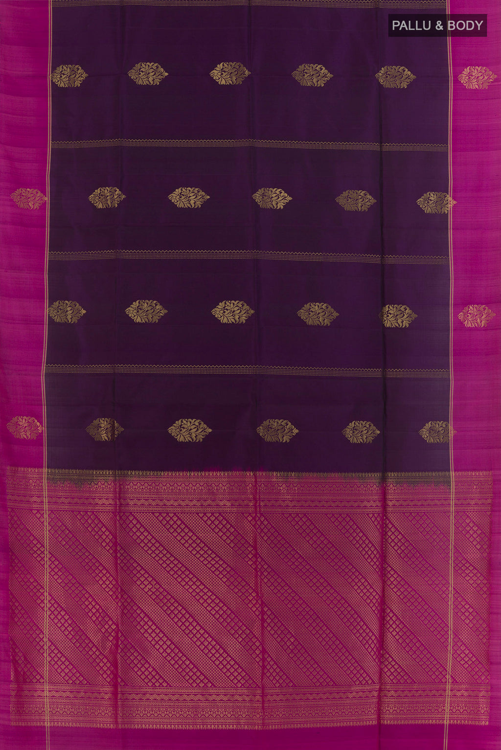 Flat view of Violet Soft Silk Saree with Zari Butta on the body and Zari Border. 