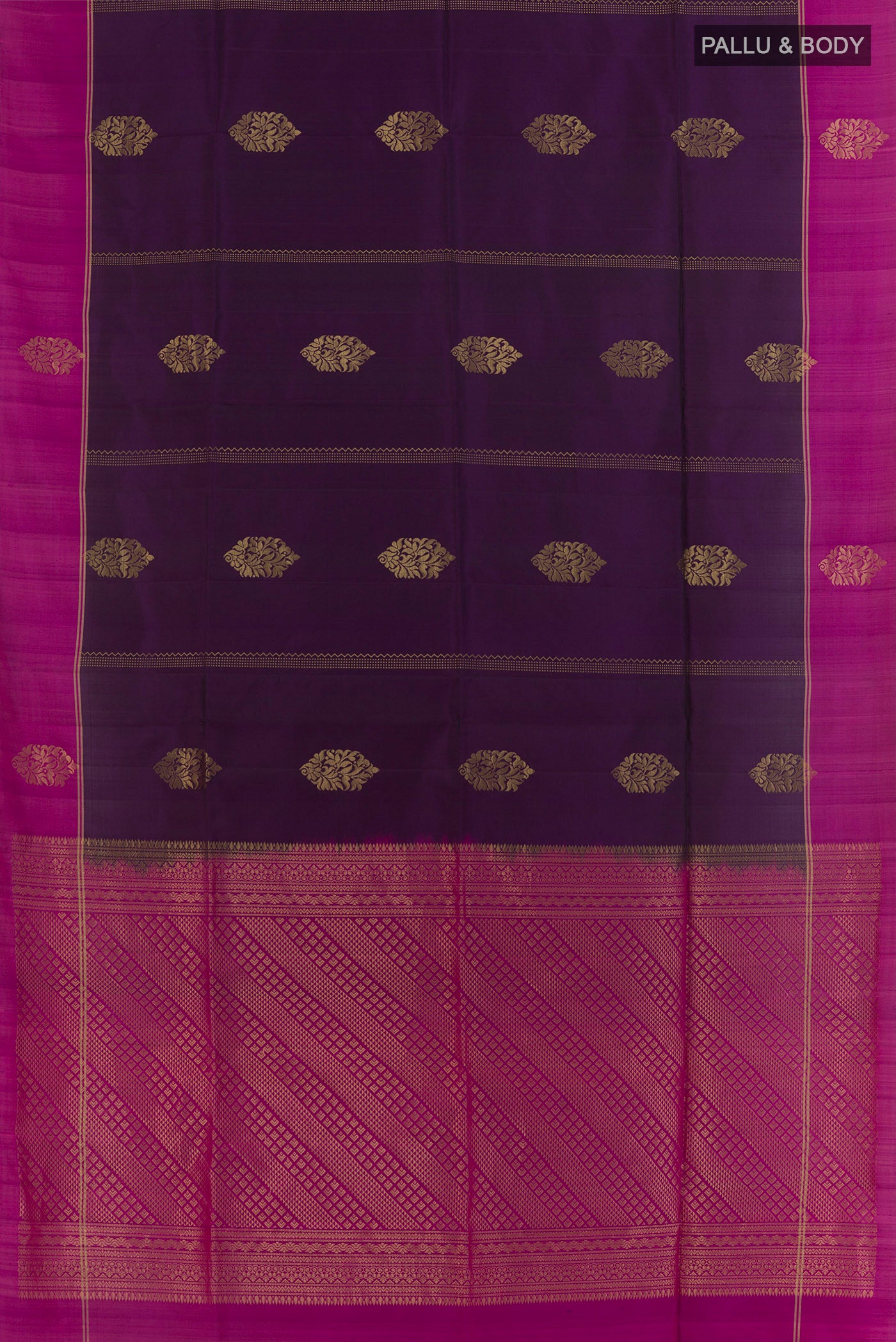 Flat view of Violet Soft Silk Saree with Zari Butta on the body and Zari Border. 