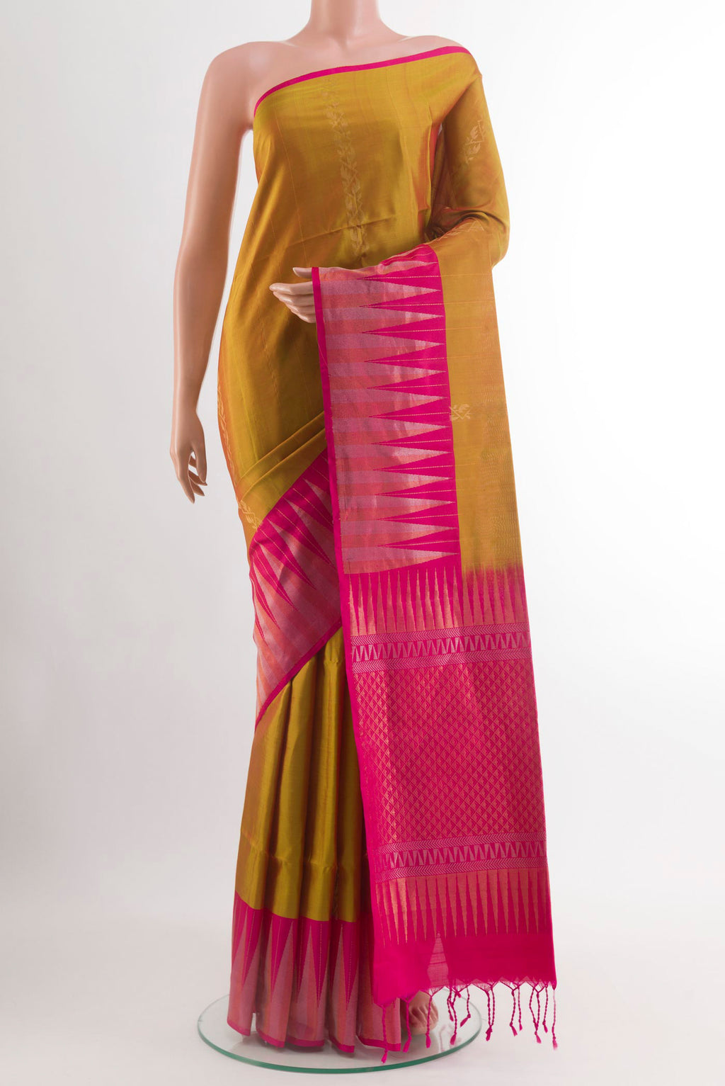 Mustard Dual Tone Soft Silk Saree with Stripes on the body and Plain Border.  displayed on a mannequin