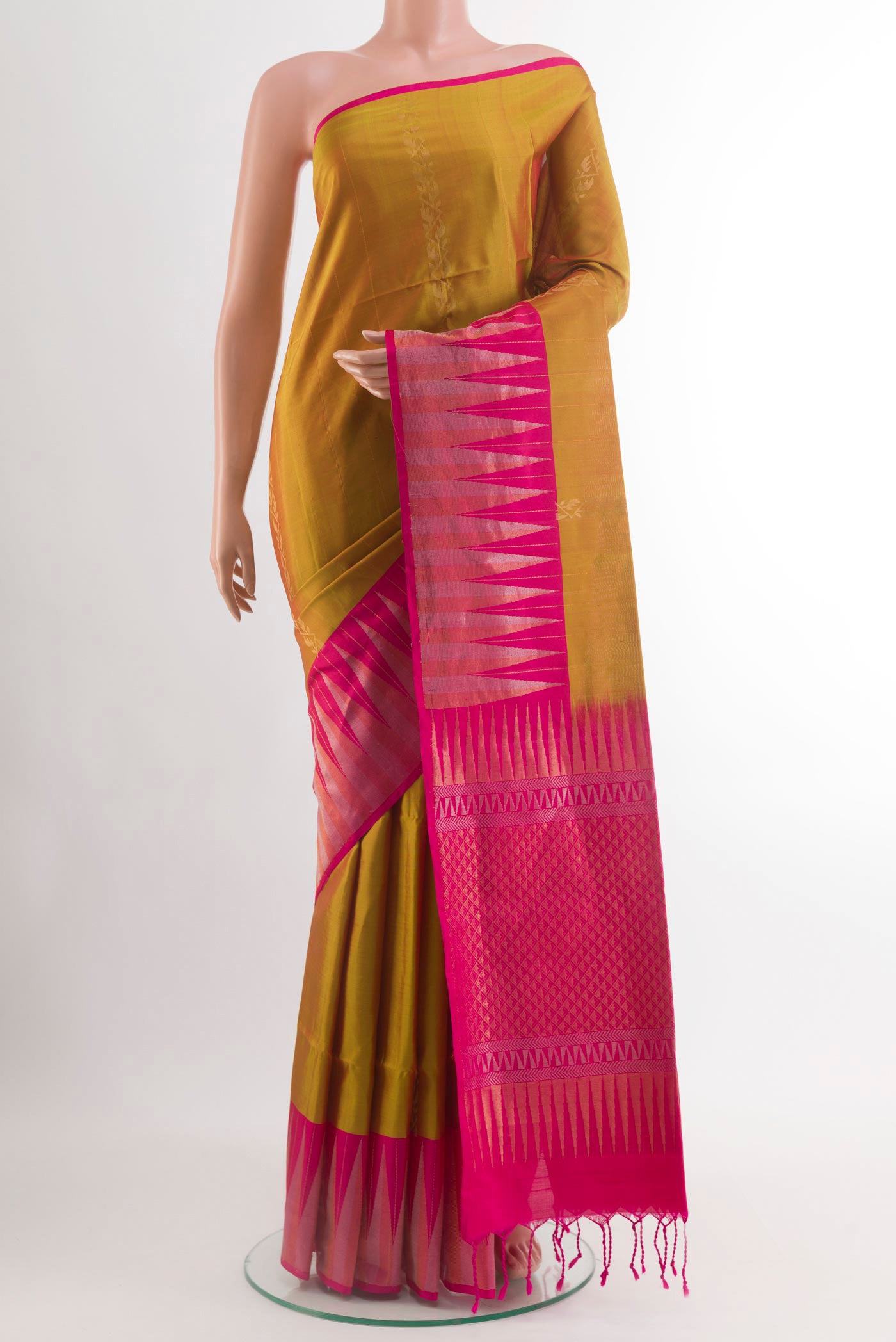 Mustard Dual Tone Soft Silk Saree with Stripes on the body and Plain Border.  displayed on a mannequin