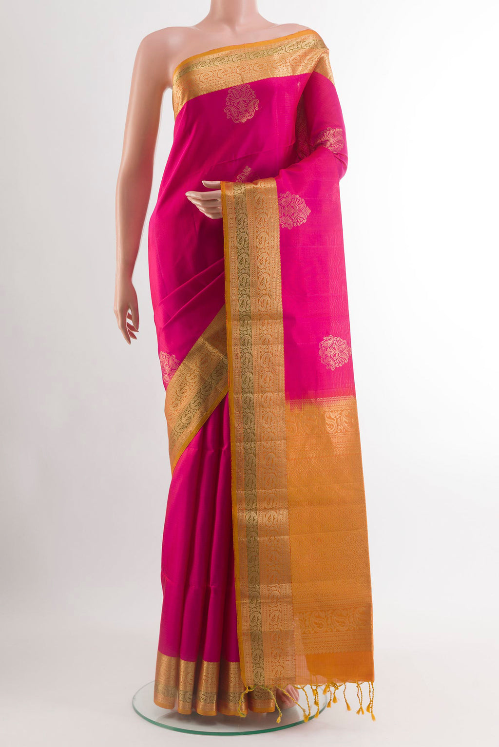 Pink Soft Silk Saree with Zari Butta on the body and Zari Border.  displayed on a mannequin