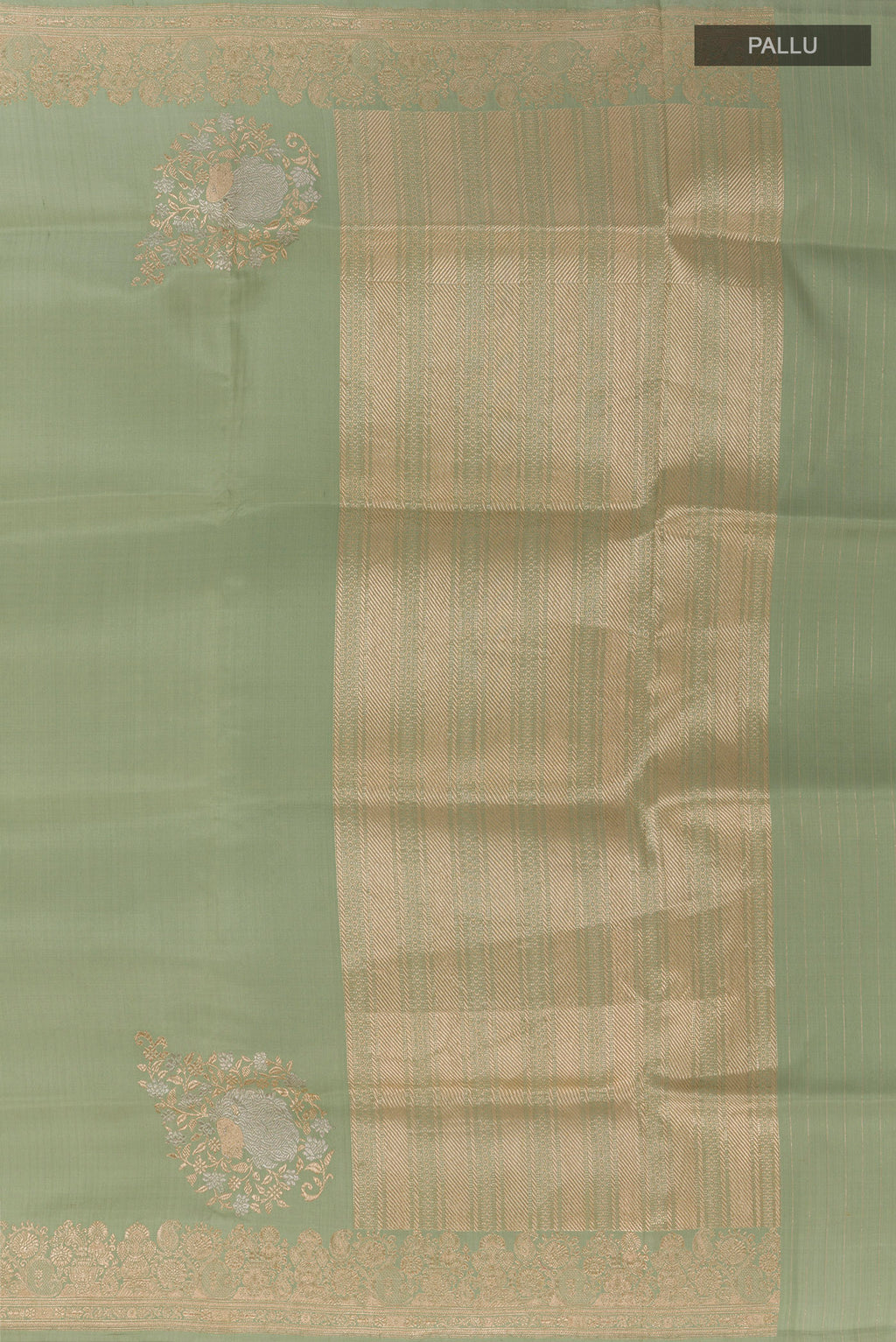 Close up image of the pallu of Sage Green Banarasi Silk Saree with Plain Body and Zari Border. 