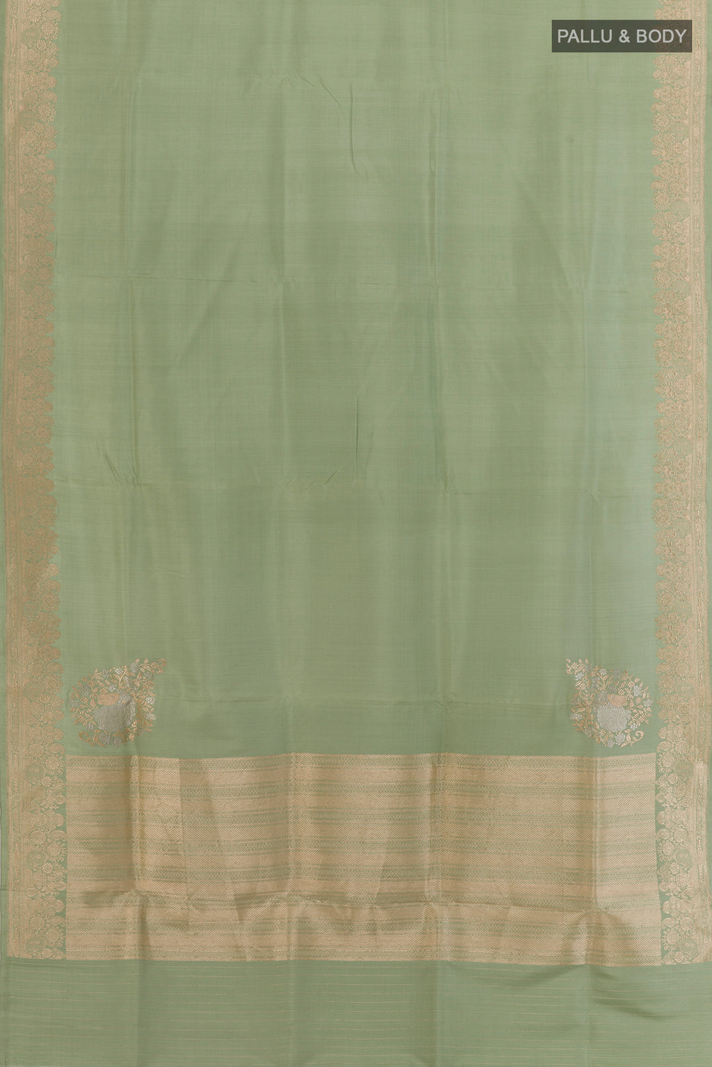 Flat view of Sage Green Banarasi Silk Saree with Plain Body and Zari Border. 
