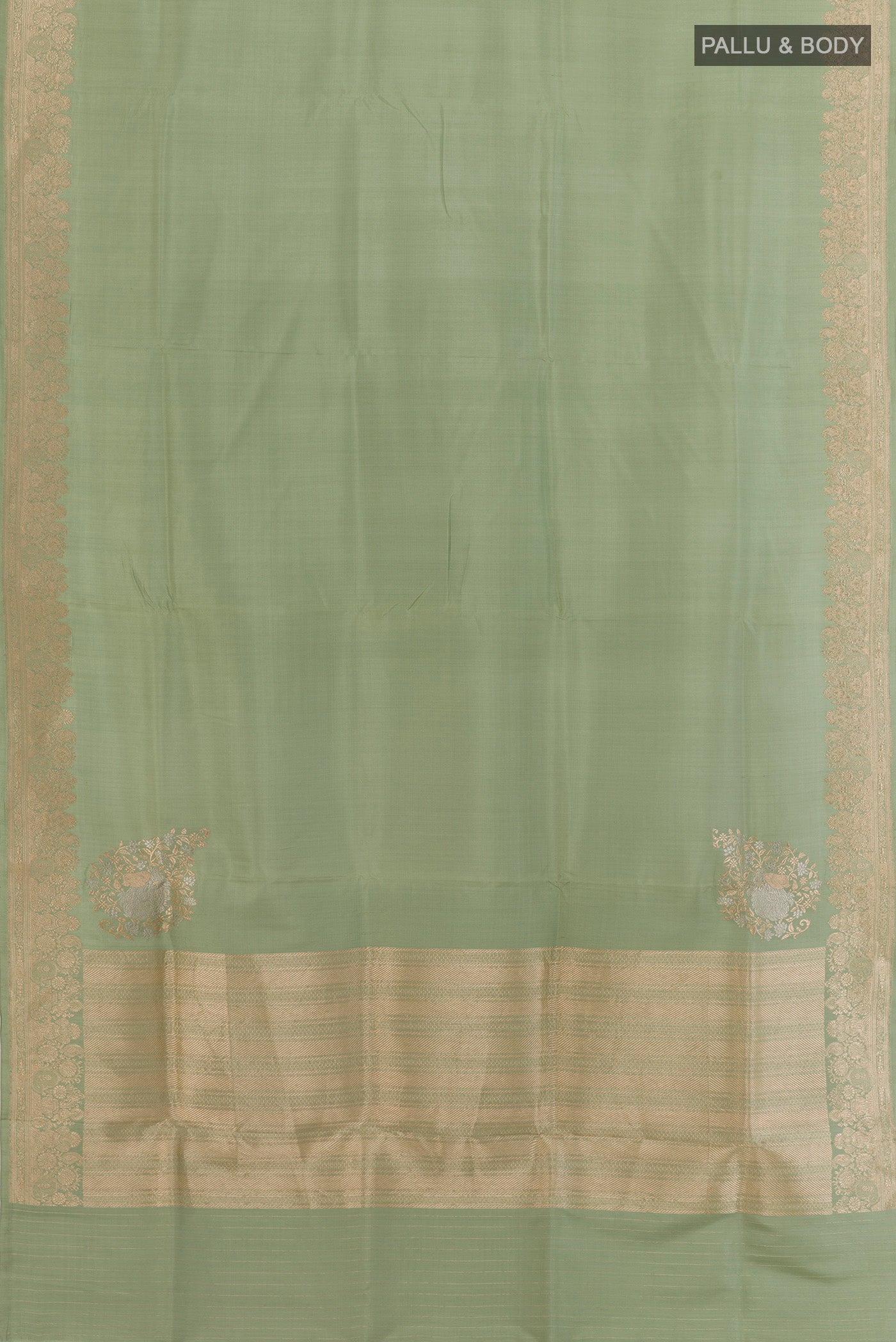 Flat view of Sage Green Banarasi Silk Saree with Plain Body and Zari Border. 