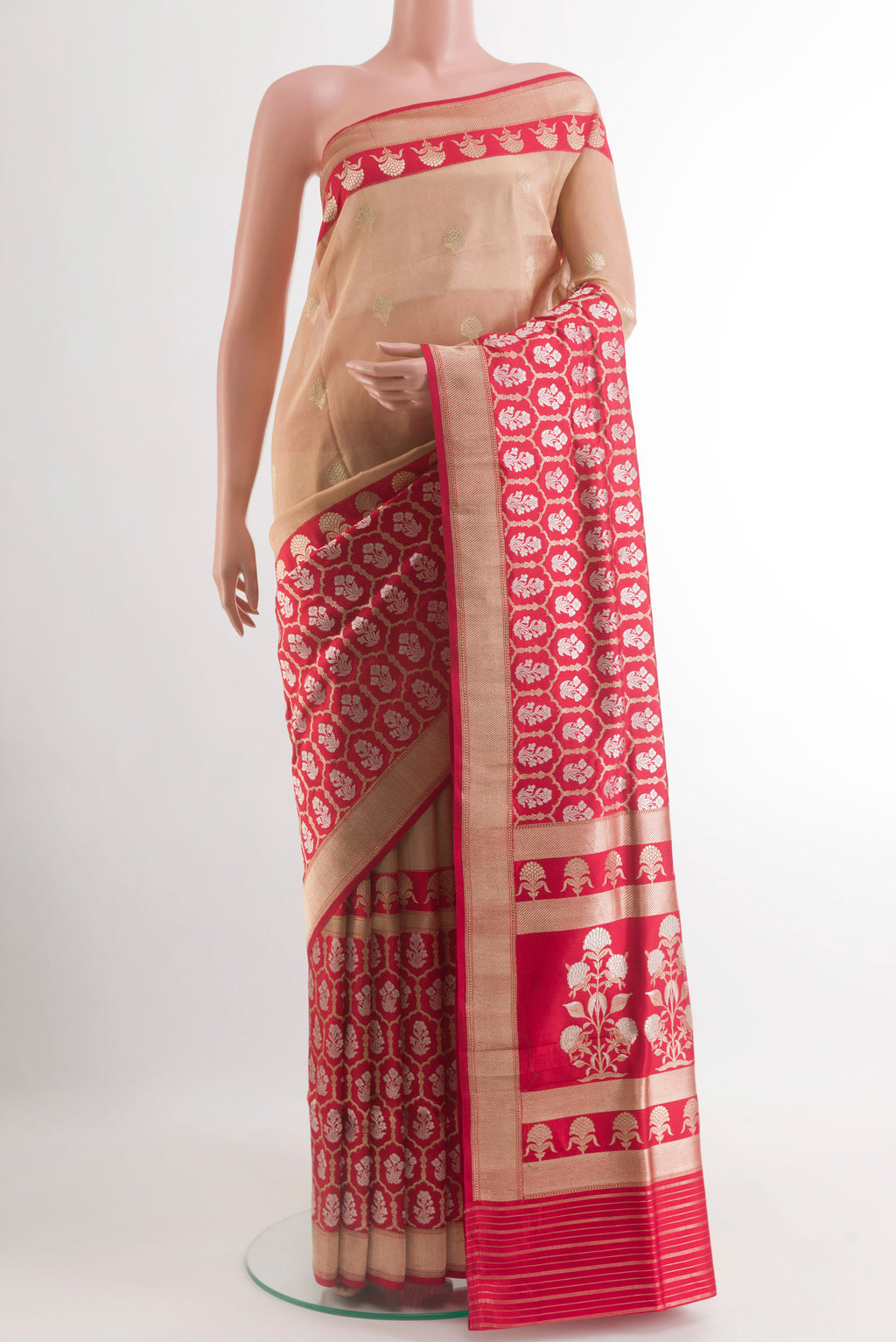 Beige Banarasi Kora Silk Saree with Zari Butta on the body and Zari Border.  displayed on a mannequin