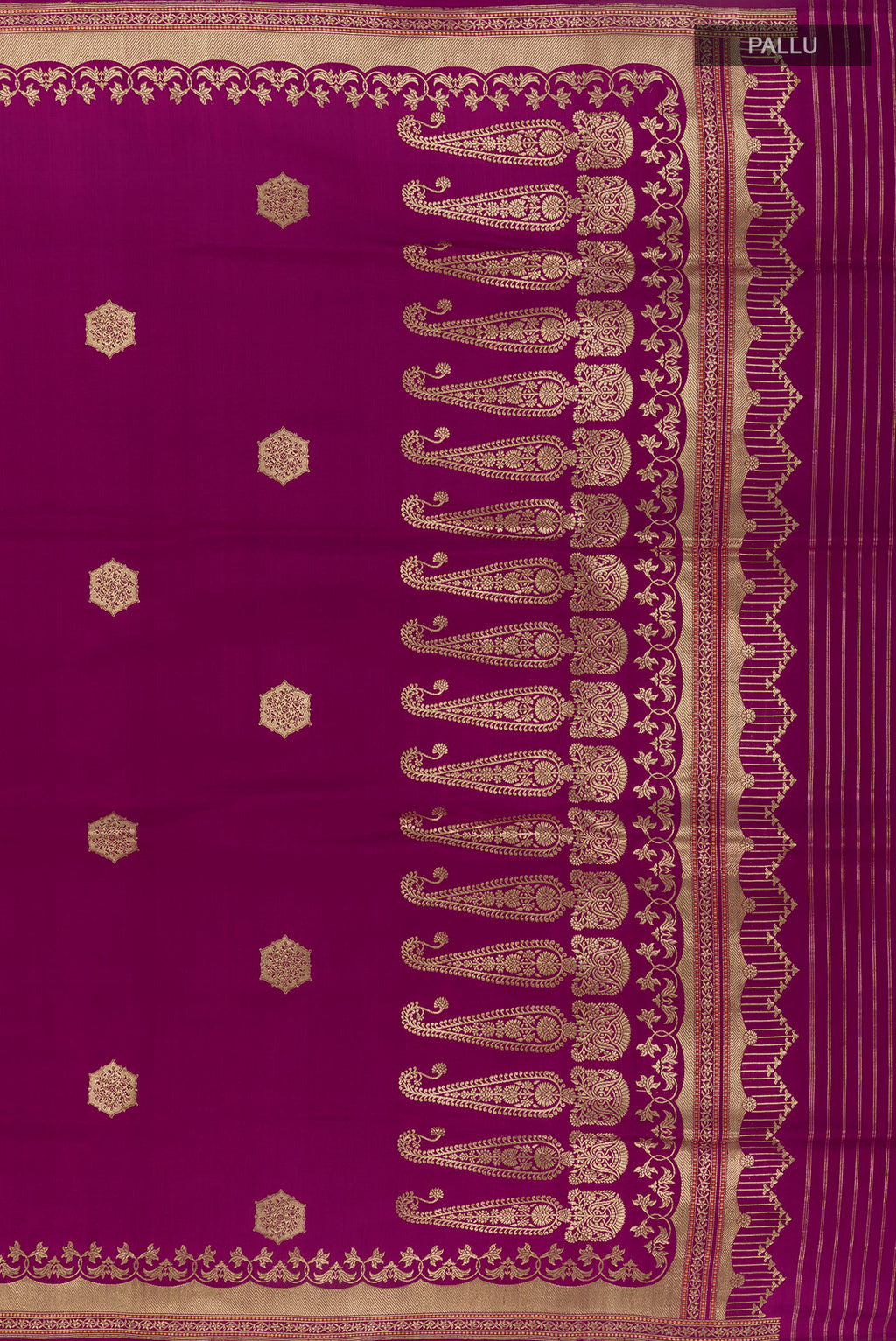 Close up image of the pallu of Pure Silk Magenta Banarasi Saree with Zari Butta on the body and Zari Border. 