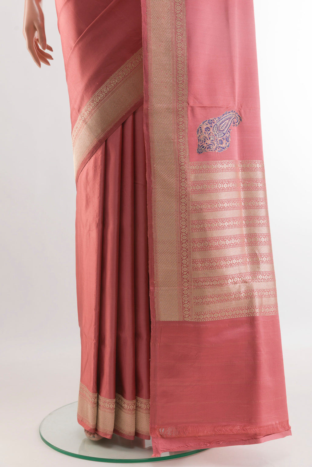 Pleats and pallu of Coral Banarasi Silk Saree with Plain Body and Zari Border. 