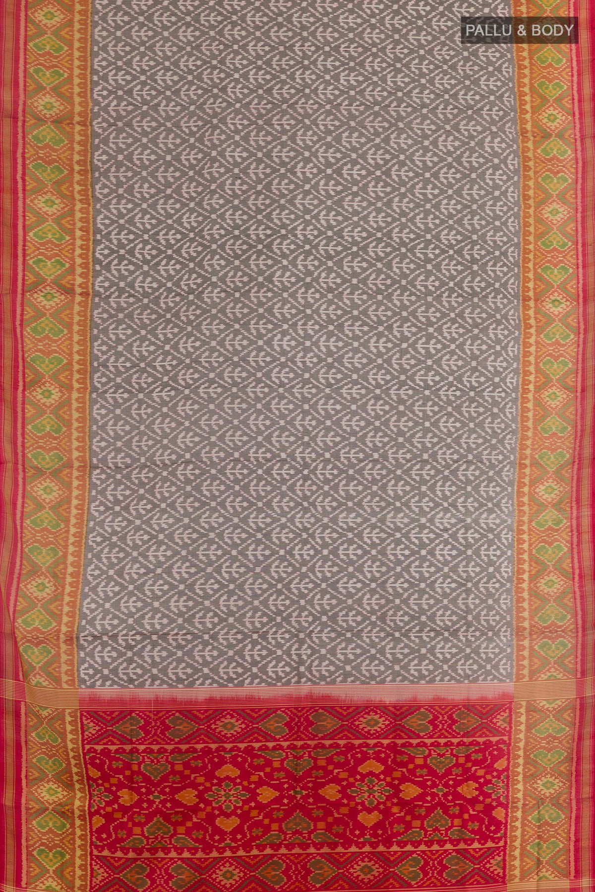 Flat view of Grey Rajkot Patola Silk Saree with Pure Ikat on the body and Ikat Border. 