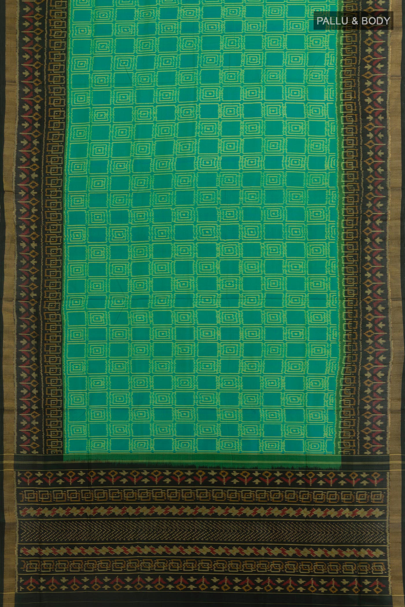 Flat view of Sea Green Rajkot Patola Silk Saree with Pure Ikat on the body and Ikat Border. 