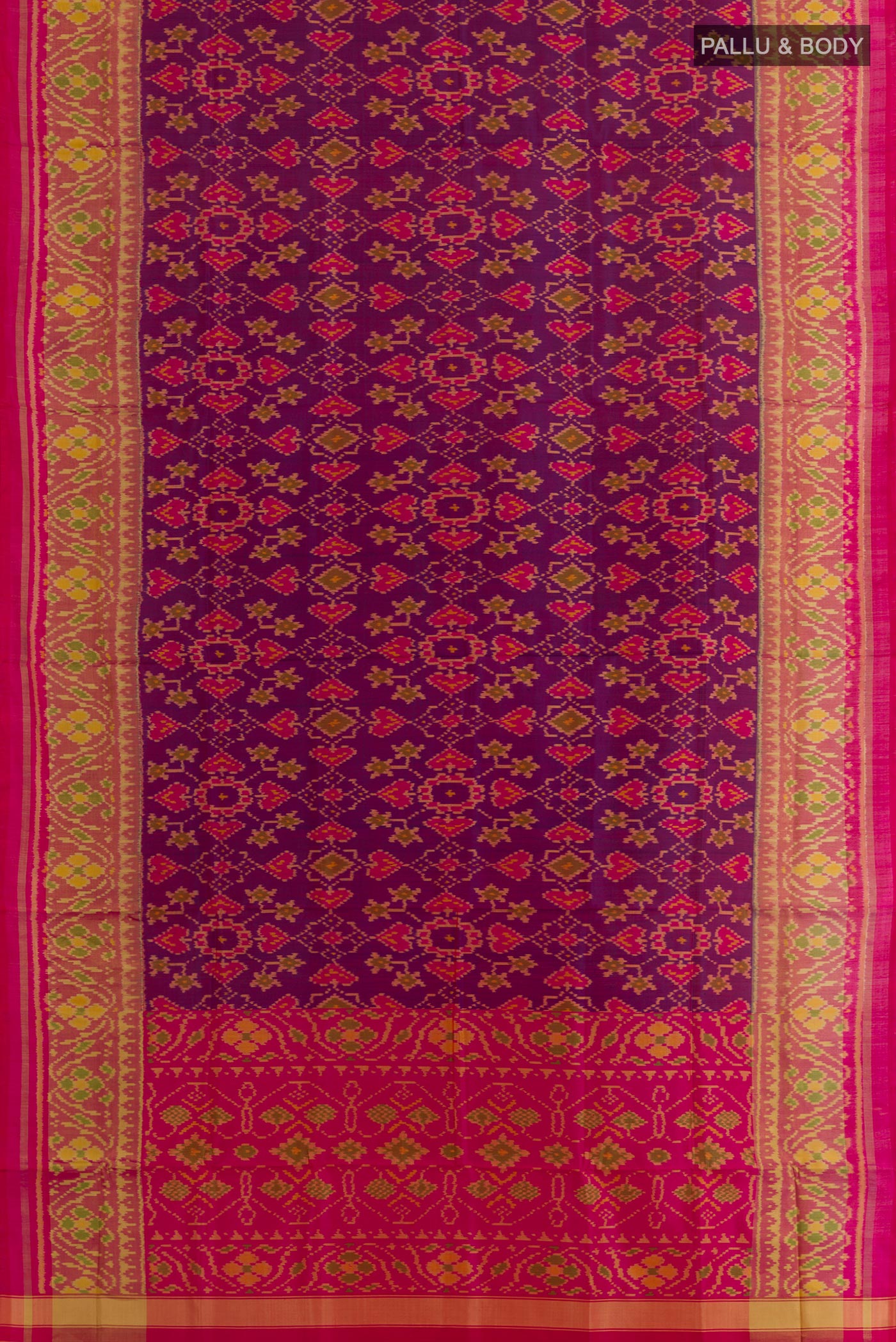 Flat view of Purple Rajkot Patola Silk Saree with Pure Ikat on the body and Ikat Border. 