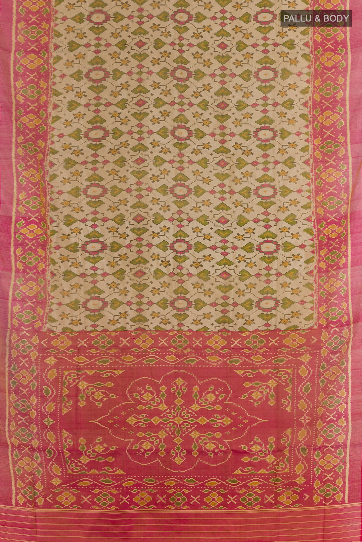 Flat view of Beige Rajkot Patola Silk Saree with Pure Ikat on the body and Ikat Border. 