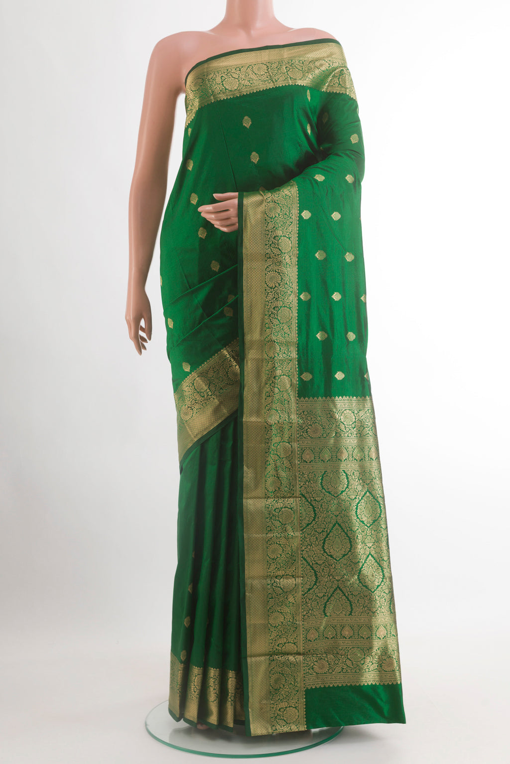Green Bangalore Silk Saree with Zari Butta on the body and Zari Border.  displayed on a mannequin