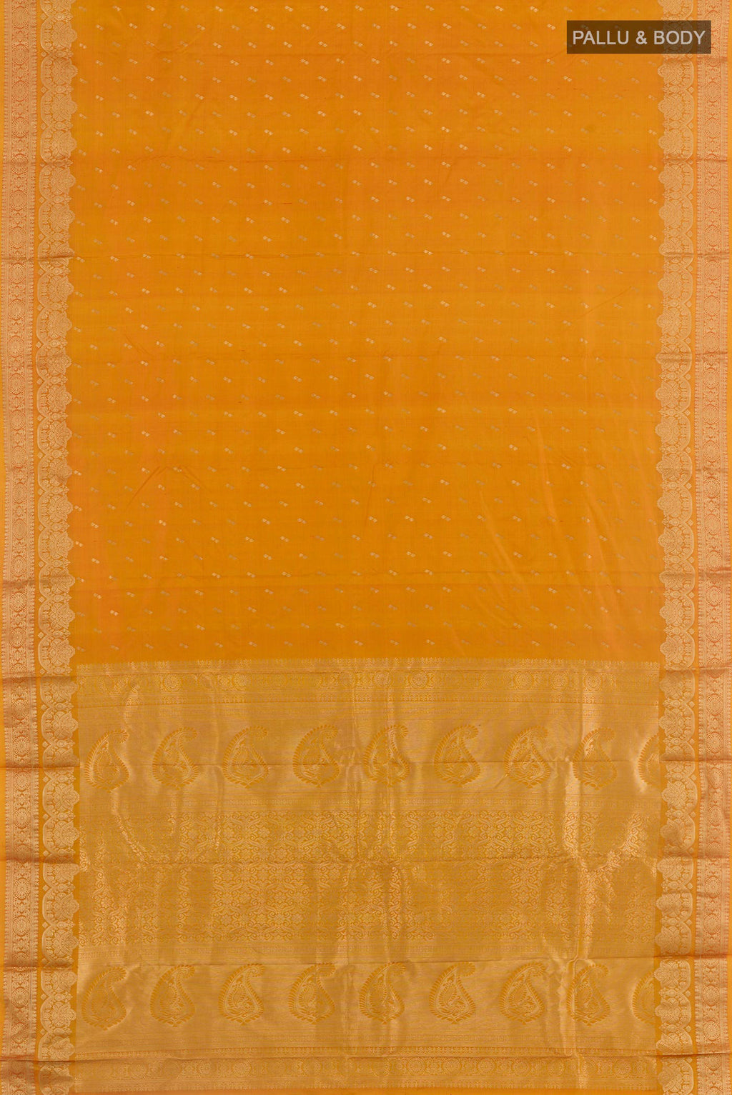 Flat view of Mustard Kanjivaram Silk Saree with Zari Butta on the body and Zari Border. 