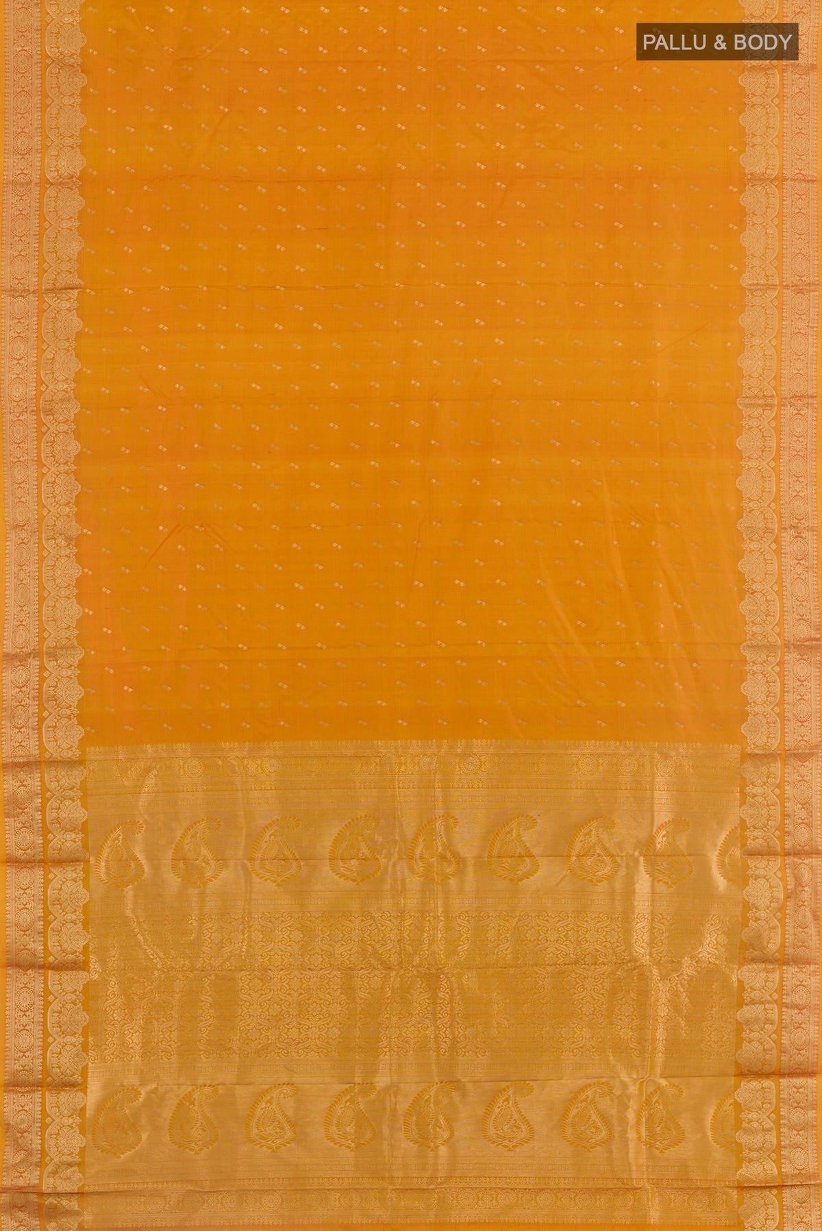 Flat view of Mustard Kanjivaram Silk Saree with Zari Butta on the body and Zari Border. 