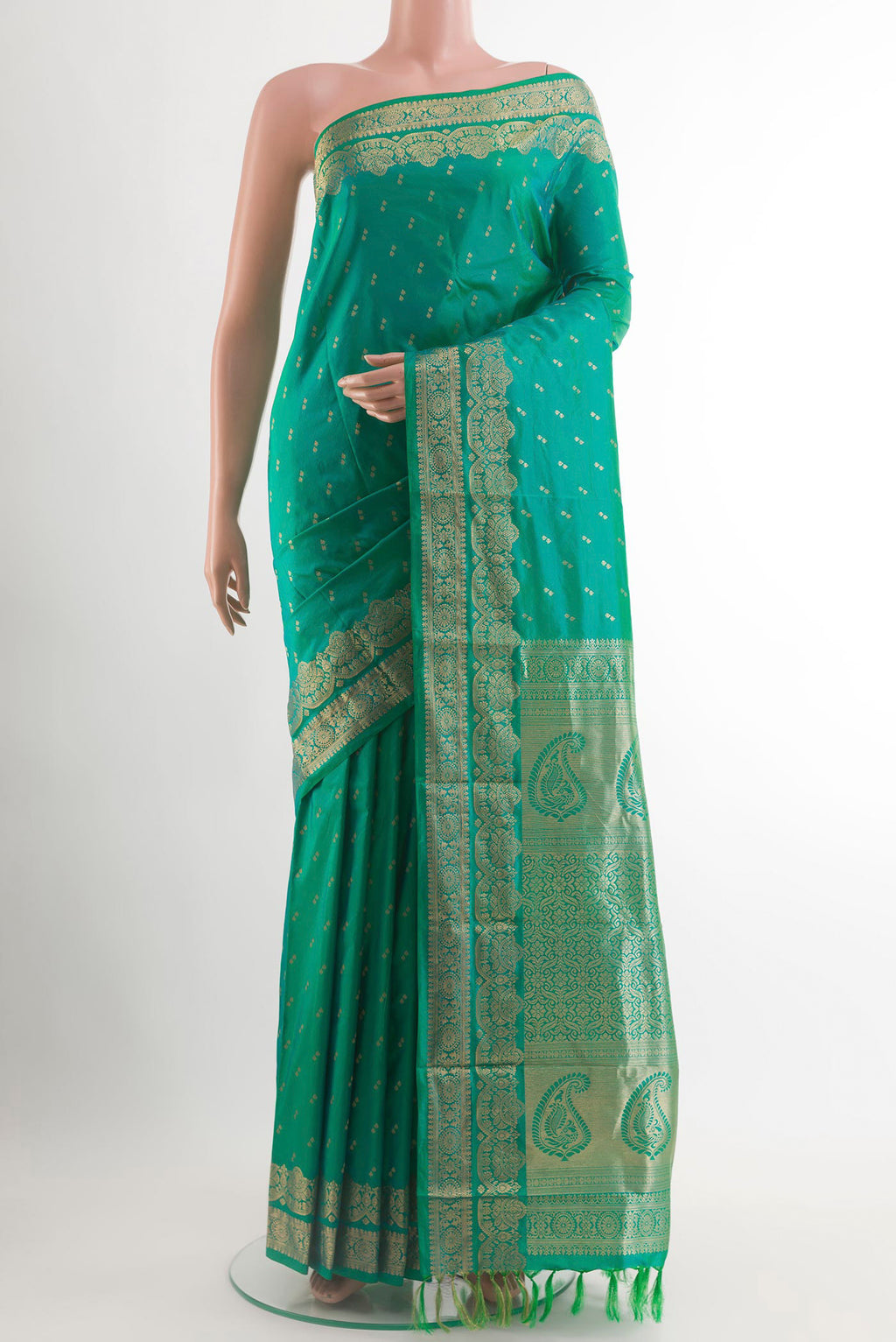 Turquoise Kanjivaram Silk Saree with Zari Butta on the body and Zari Border.  displayed on a mannequin