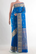 Pure Silk Blue Kanjivaram Saree with Zari Butta on the body and Zari Border.  displayed on a mannequin
