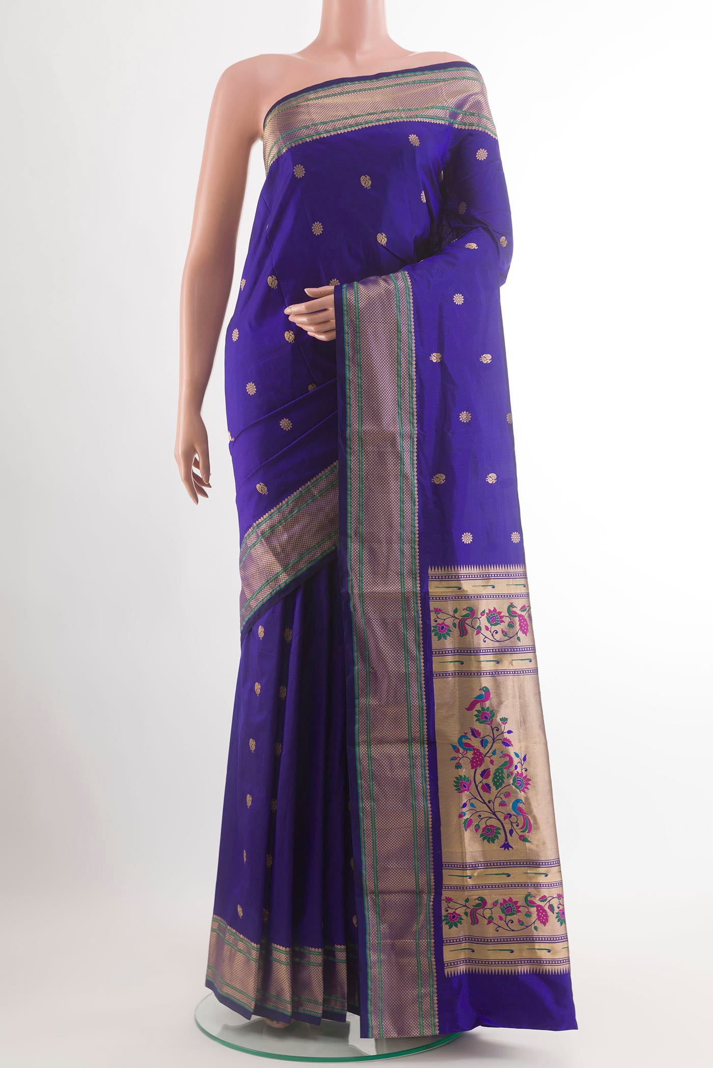 Royal Blue Paithani Silk Saree with Zari Butta on the body and Zari Border.  displayed on a mannequin