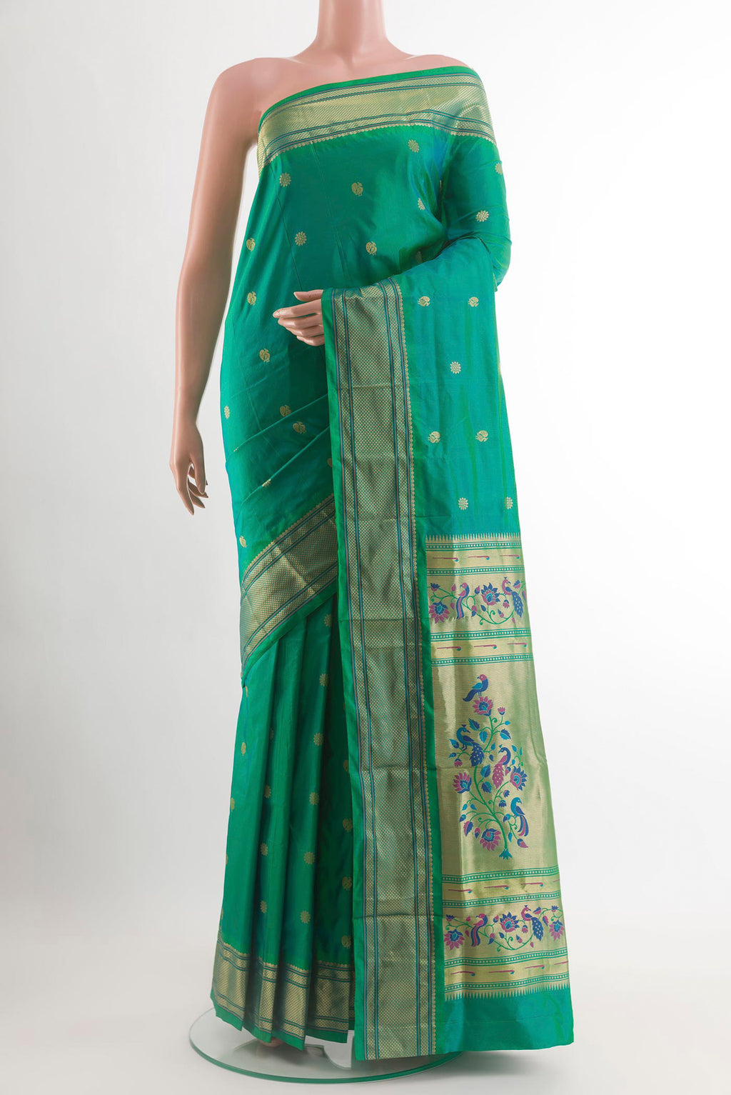 Sea Green Paithani Silk Saree with Zari Butta on the body and Zari Border.  displayed on a mannequin